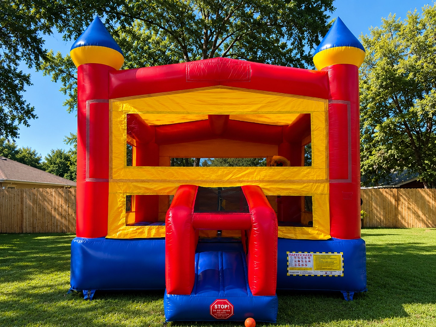 Avengers themed bounce house rental at a backyard birthday